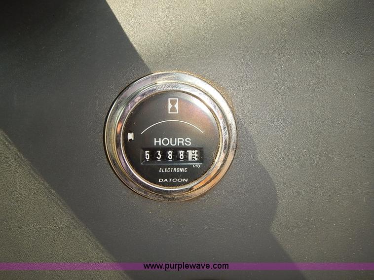 image for item J3022 2000 New Holland TS100 tractor