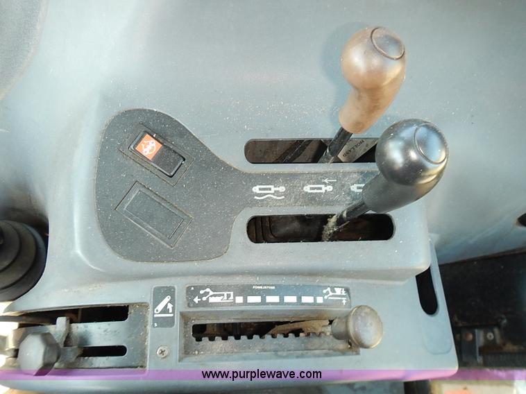 image for item J3022 2000 New Holland TS100 tractor