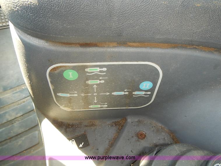 image for item J3022 2000 New Holland TS100 tractor