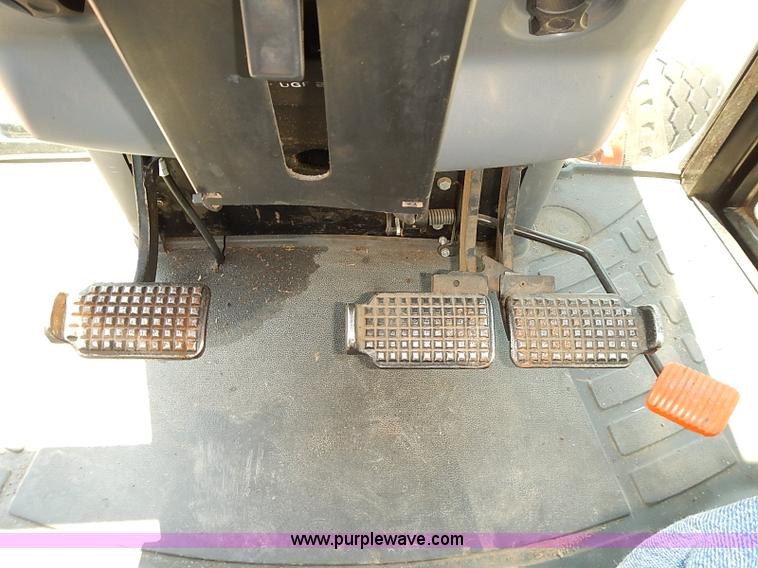 image for item J3022 2000 New Holland TS100 tractor