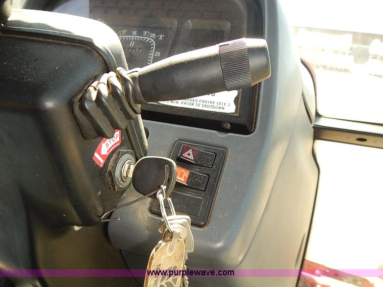 image for item J3022 2000 New Holland TS100 tractor