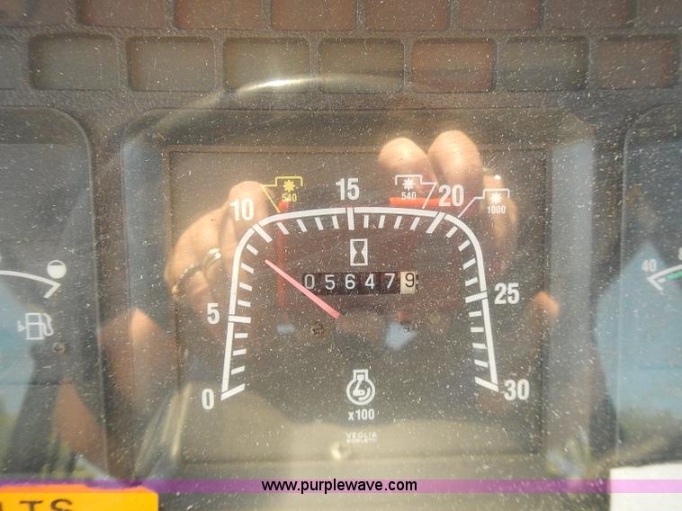 image for item J3022 2000 New Holland TS100 tractor