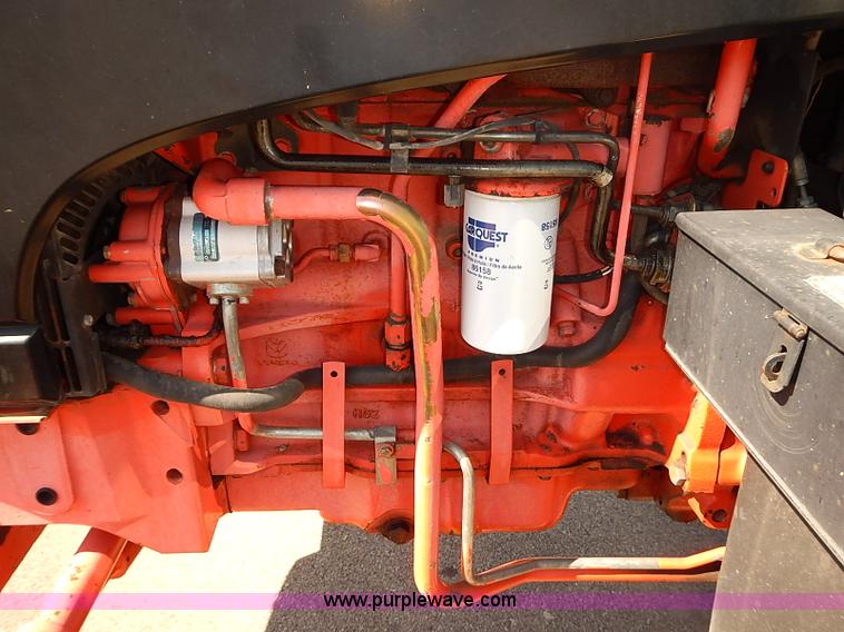 image for item J3022 2000 New Holland TS100 tractor