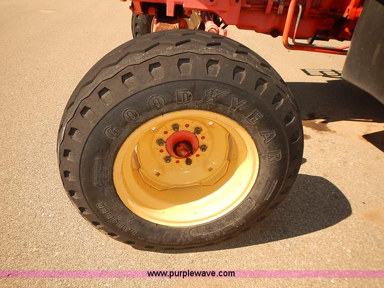 image for item J3022 2000 New Holland TS100 tractor