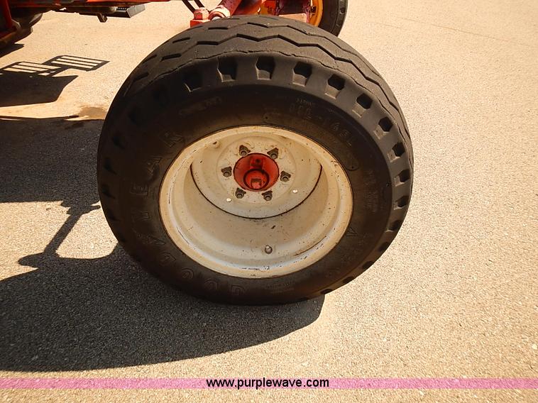 image for item J3022 2000 New Holland TS100 tractor