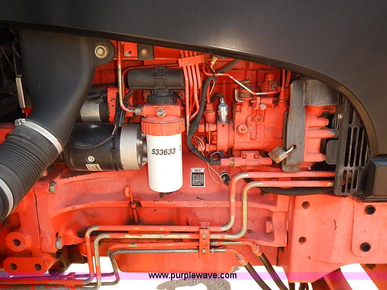 image for item J3022 2000 New Holland TS100 tractor