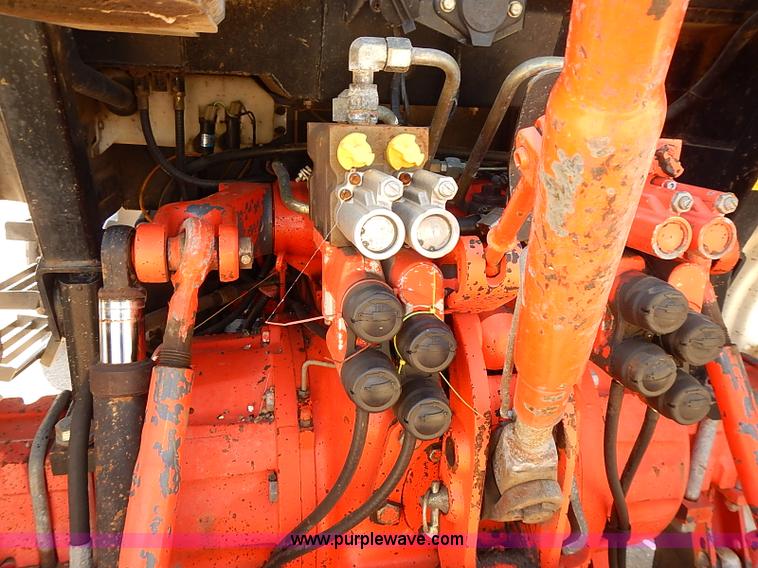 image for item J3022 2000 New Holland TS100 tractor