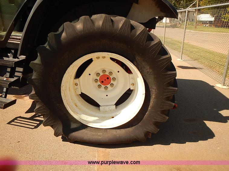 image for item J3022 2000 New Holland TS100 tractor