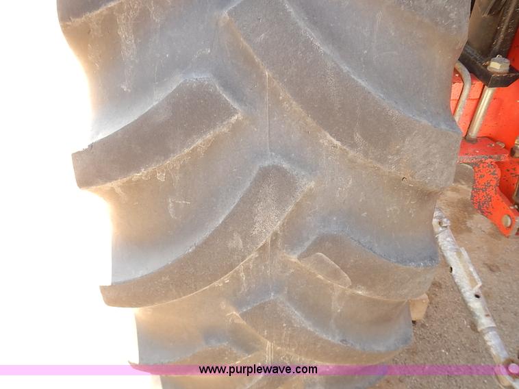 image for item J3022 2000 New Holland TS100 tractor