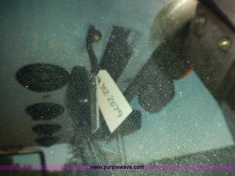 image for item J3022 2000 New Holland TS100 tractor