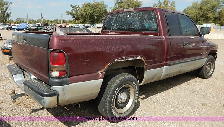 image for item I5438 2000 Dodge Ram 1500 Quad Cab pickup truck