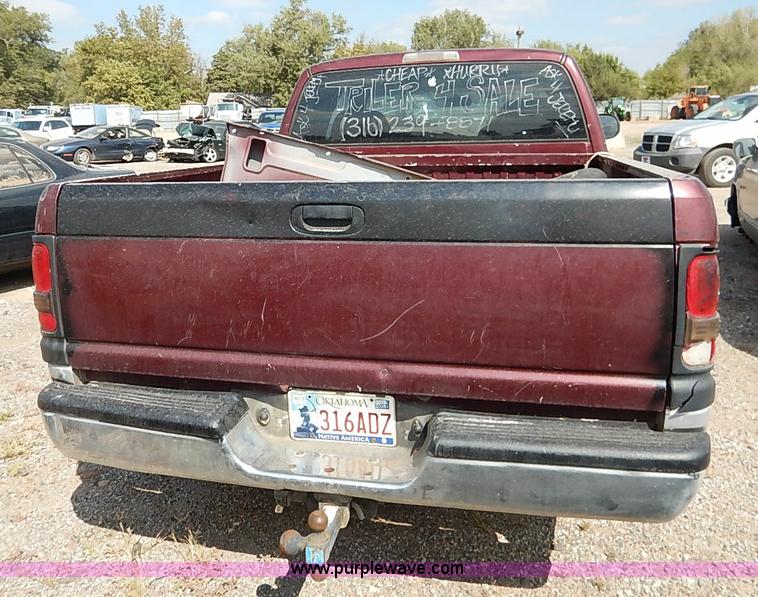 image for item I5438 2000 Dodge Ram 1500 Quad Cab pickup truck