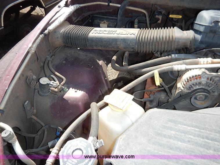 image for item I5438 2000 Dodge Ram 1500 Quad Cab pickup truck