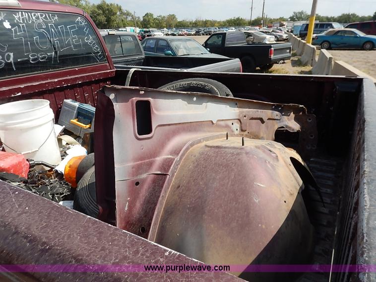 image for item I5438 2000 Dodge Ram 1500 Quad Cab pickup truck