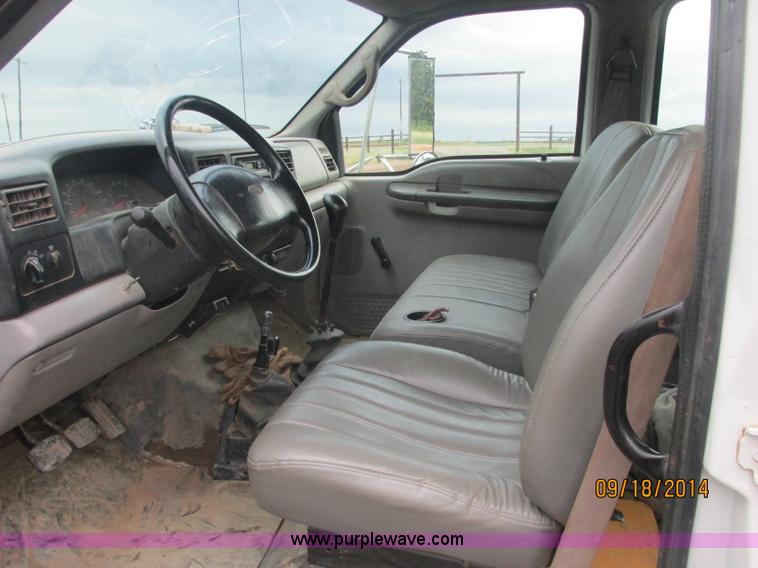 image for item J2466 2000 Ford F650 Crew Cab flatbed truck