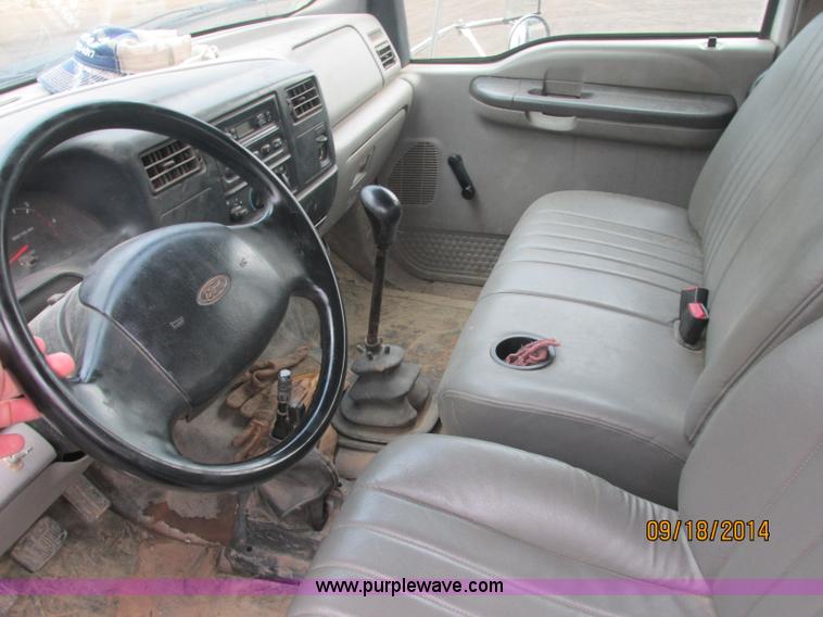 image for item J2466 2000 Ford F650 Crew Cab flatbed truck