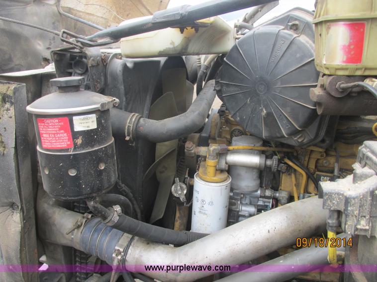 image for item J2466 2000 Ford F650 Crew Cab flatbed truck