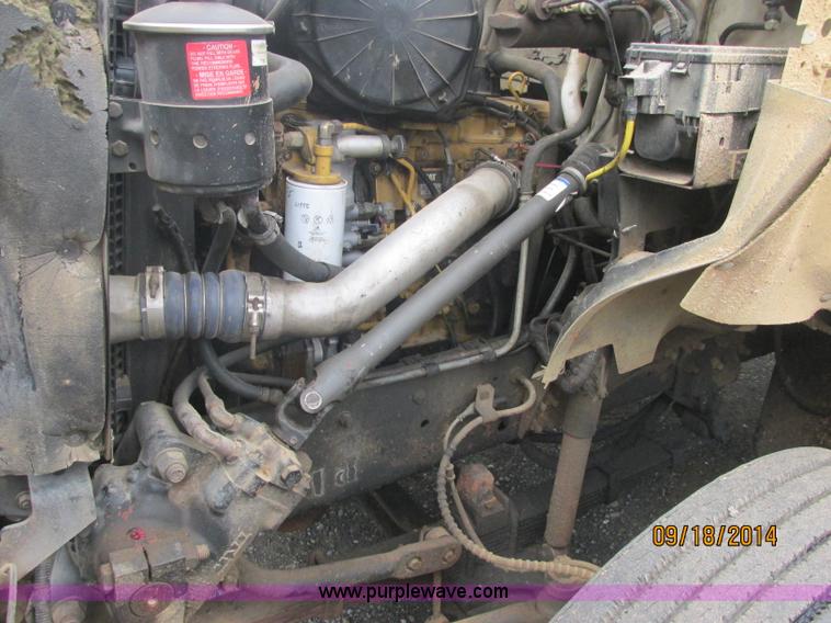 image for item J2466 2000 Ford F650 Crew Cab flatbed truck