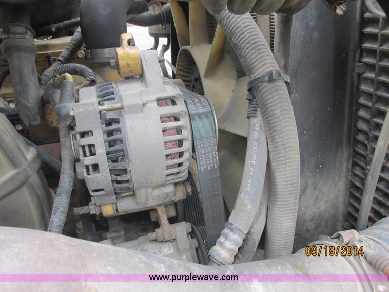 image for item J2466 2000 Ford F650 Crew Cab flatbed truck