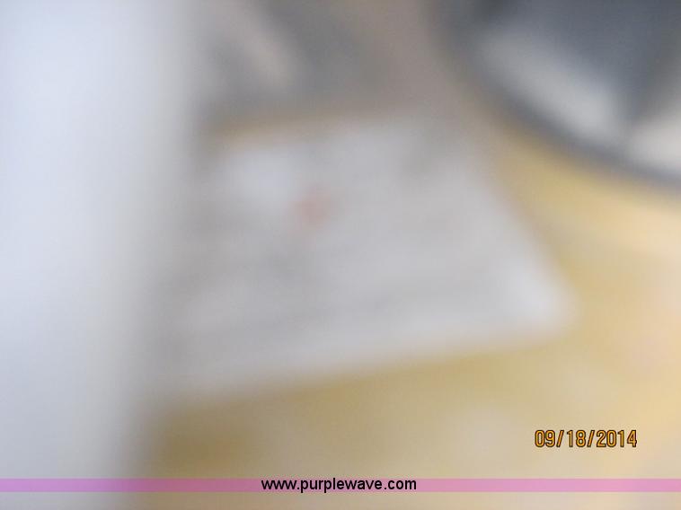 image for item J2466 2000 Ford F650 Crew Cab flatbed truck