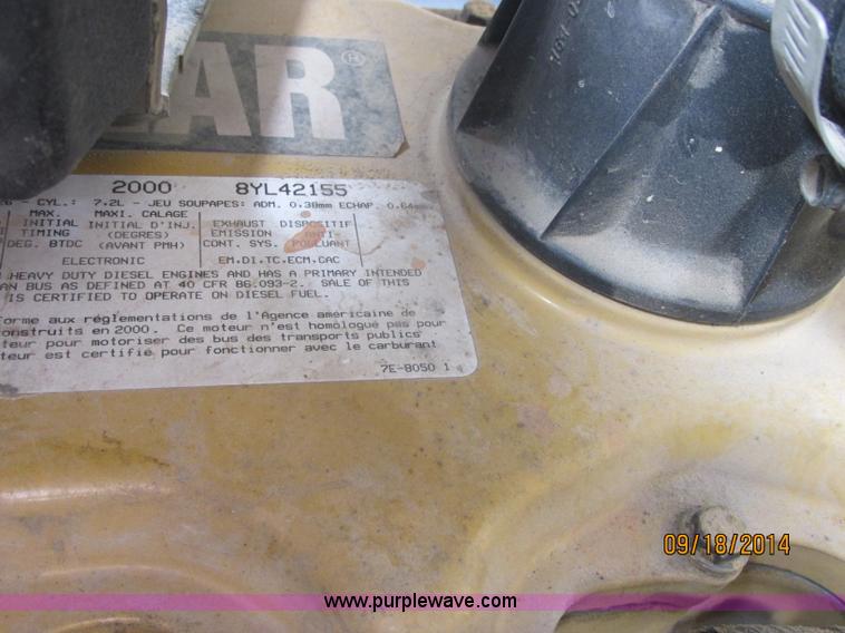 image for item J2466 2000 Ford F650 Crew Cab flatbed truck