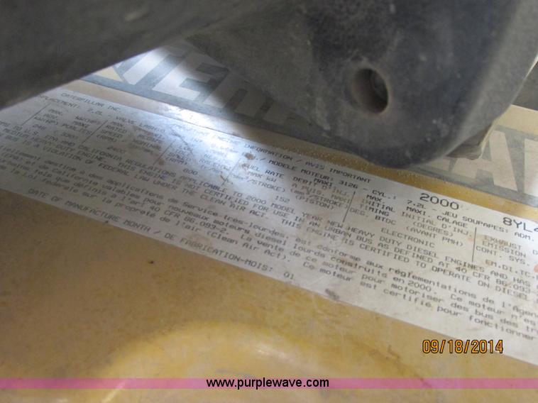 image for item J2466 2000 Ford F650 Crew Cab flatbed truck