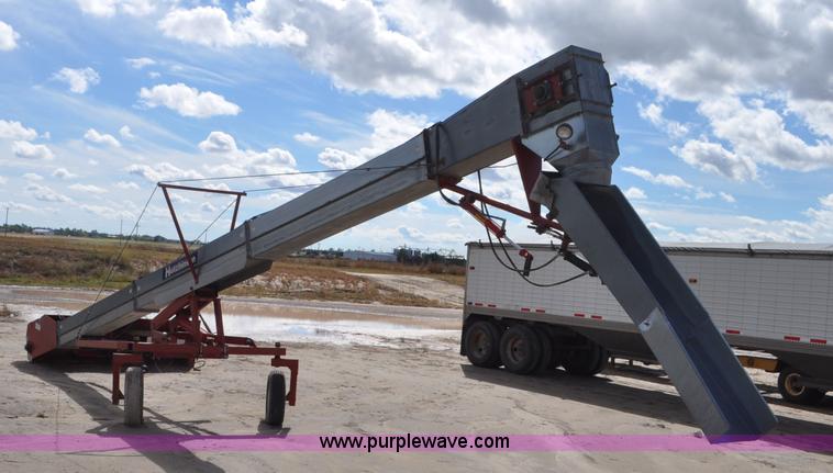 image for item F2057 Hutchinson Trac Mass-Ter 40' flat storage unloader