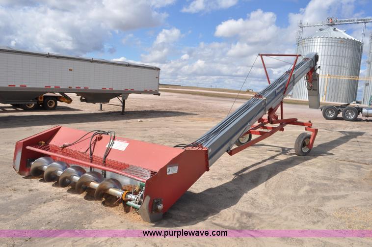 image for item F2057 Hutchinson Trac Mass-Ter 40' flat storage unloader