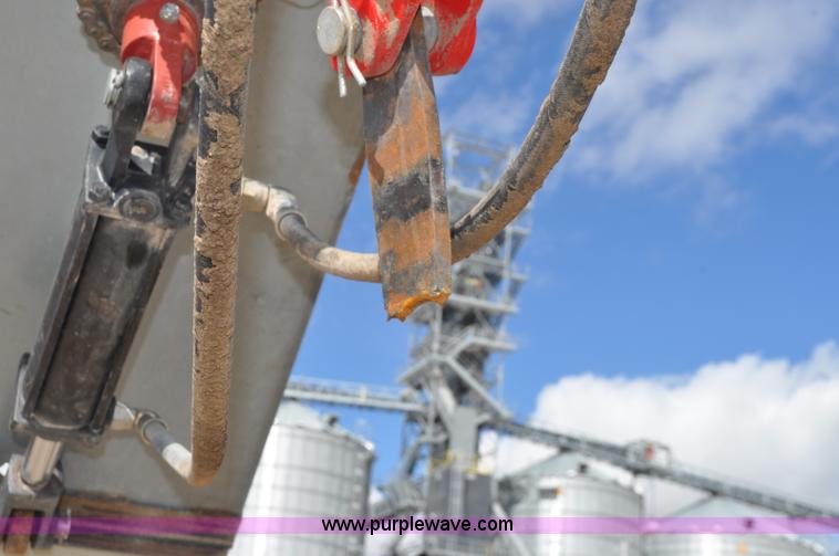 image for item F2057 Hutchinson Trac Mass-Ter 40' flat storage unloader