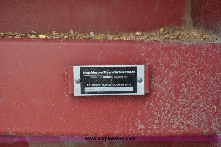 image for item F2057 Hutchinson Trac Mass-Ter 40' flat storage unloader