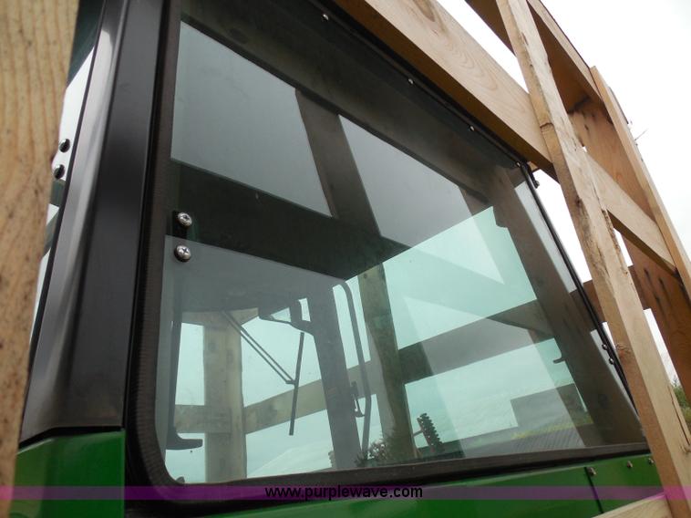 image for item I3329 1988 John Deere tractor cab