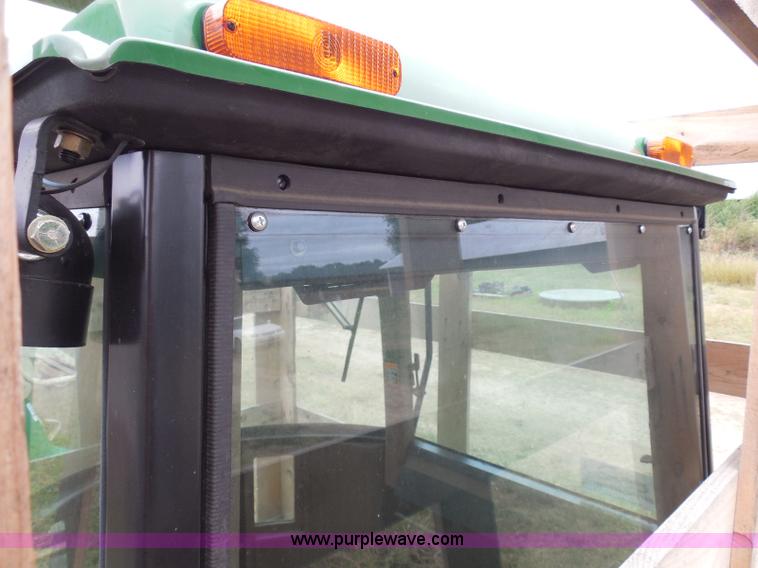 image for item I3329 1988 John Deere tractor cab