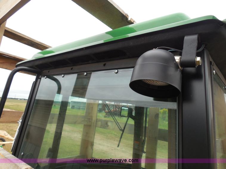 image for item I3329 1988 John Deere tractor cab