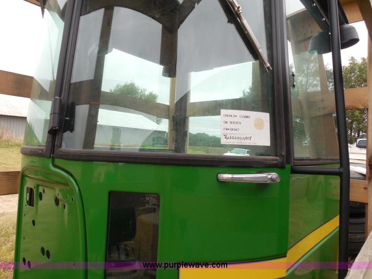 image for item I3329 1988 John Deere tractor cab