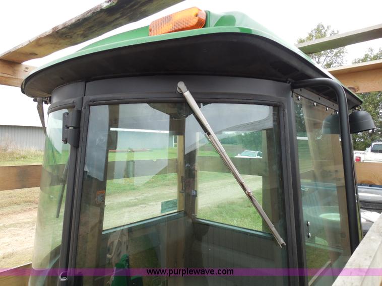 image for item I3329 1988 John Deere tractor cab