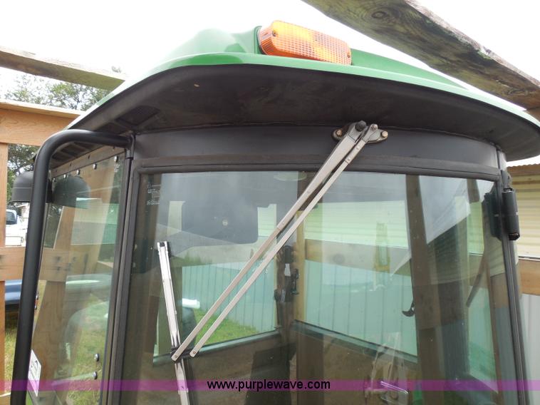 image for item I3329 1988 John Deere tractor cab