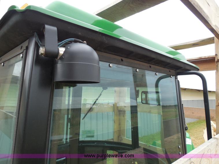 image for item I3329 1988 John Deere tractor cab