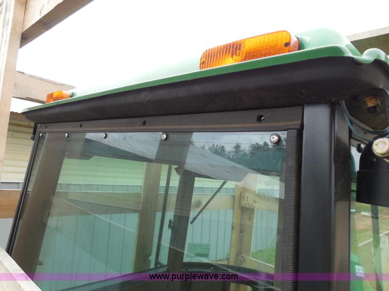 image for item I3329 1988 John Deere tractor cab