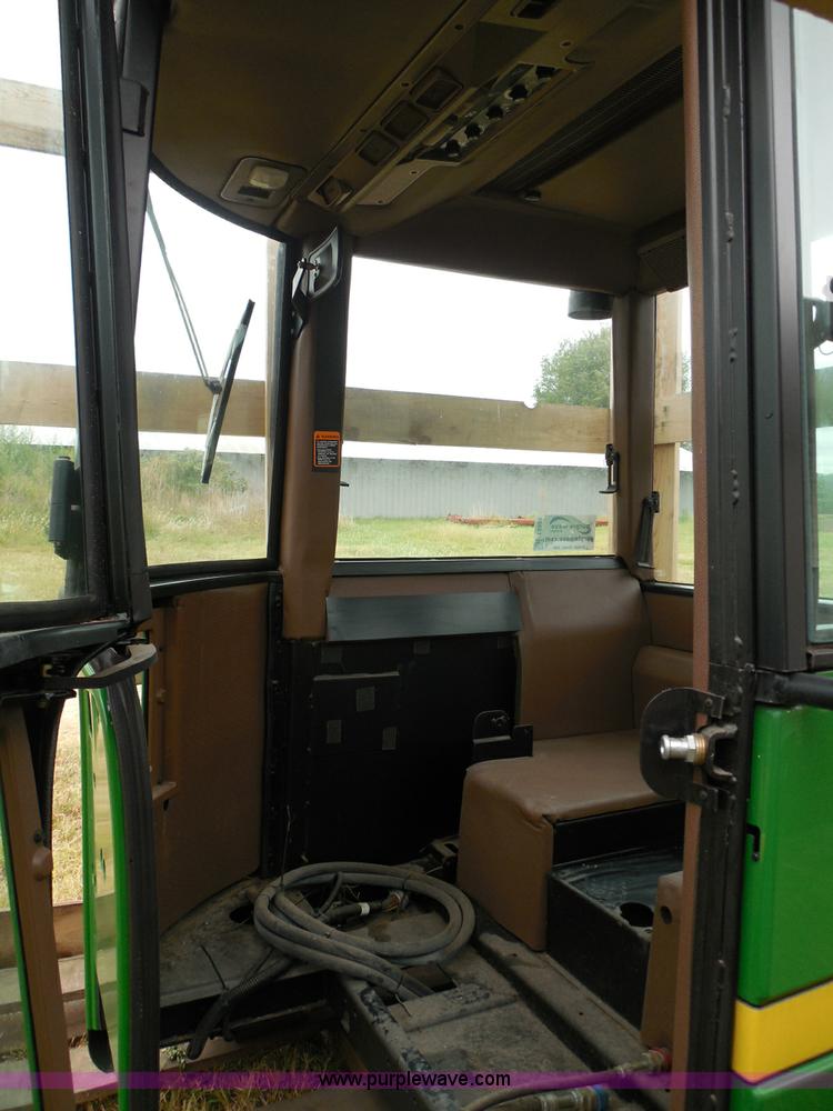 image for item I3329 1988 John Deere tractor cab