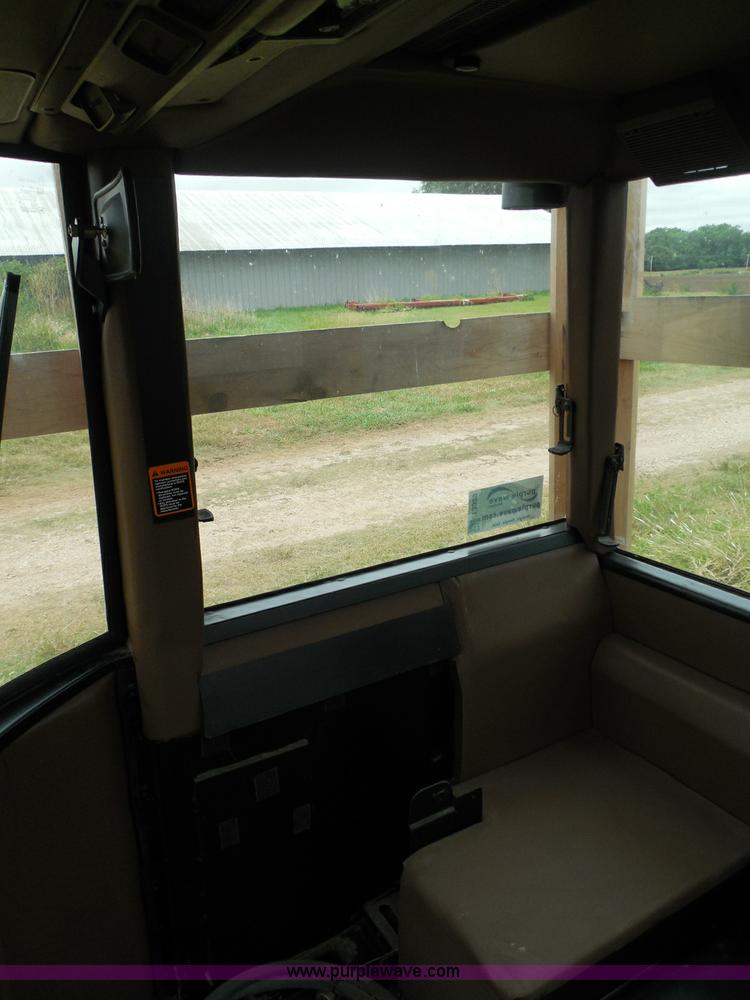 image for item I3329 1988 John Deere tractor cab