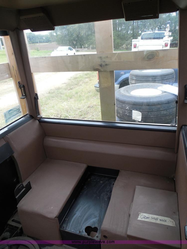 image for item I3329 1988 John Deere tractor cab