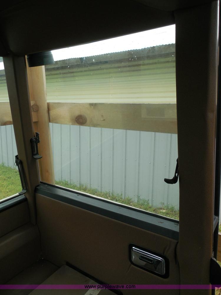 image for item I3329 1988 John Deere tractor cab