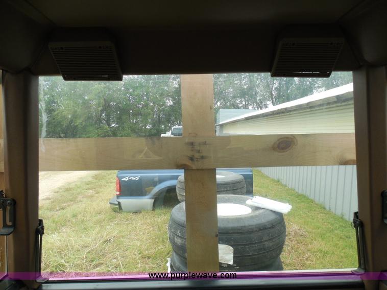 image for item I3329 1988 John Deere tractor cab