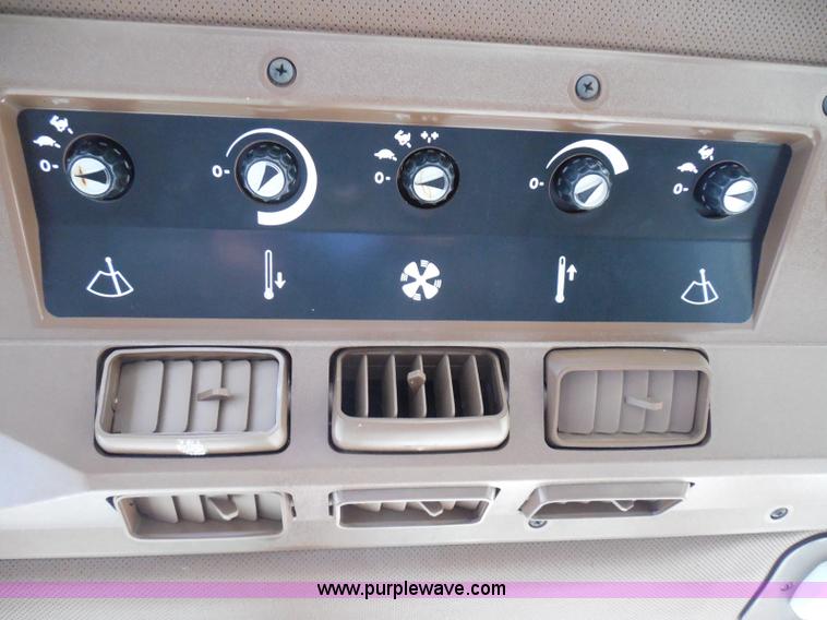 image for item I3329 1988 John Deere tractor cab