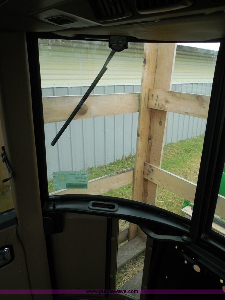 image for item I3329 1988 John Deere tractor cab