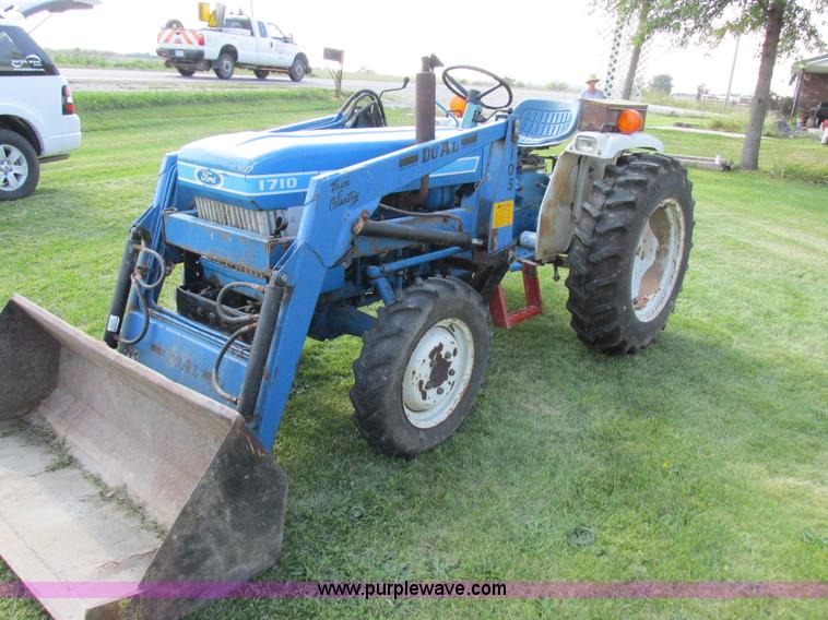 image for item I8927 Ford 1710 MFWD tractor
