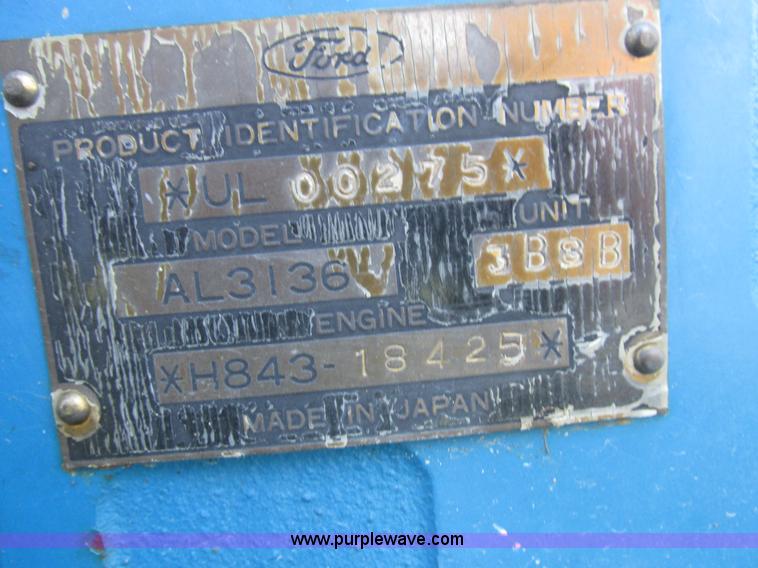 image for item I8927 Ford 1710 MFWD tractor