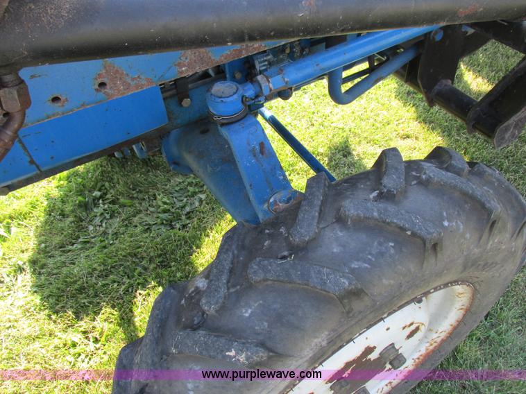 image for item I8927 Ford 1710 MFWD tractor