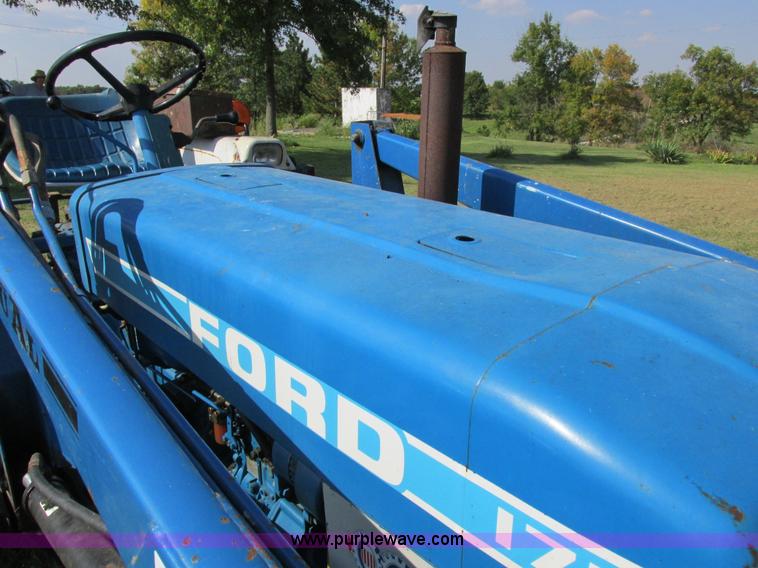 image for item I8927 Ford 1710 MFWD tractor