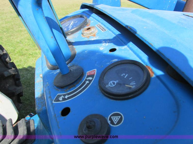 image for item I8927 Ford 1710 MFWD tractor